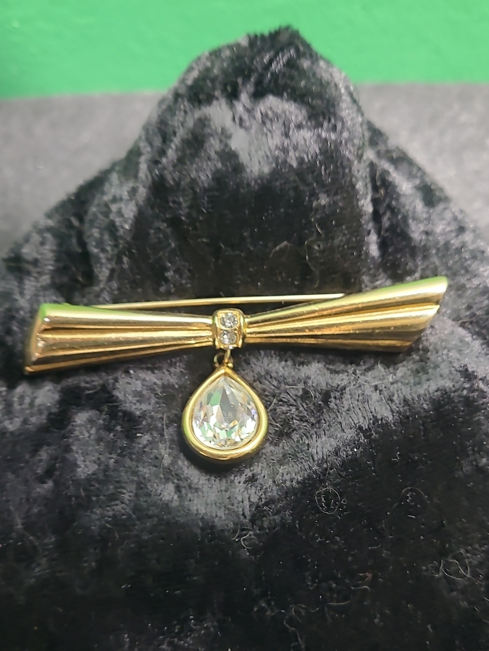 Vintage Monet Gold-Tone Bow Brooch with Clear Teardrop Crystal